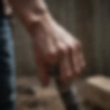 Gritty close-up of a hand gripping a weapon with determination