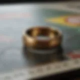 Detailed view of the Monopoly game piece resembling the One Ring